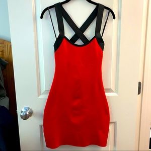 Red and black, straps, bandage-type dress. HOT!